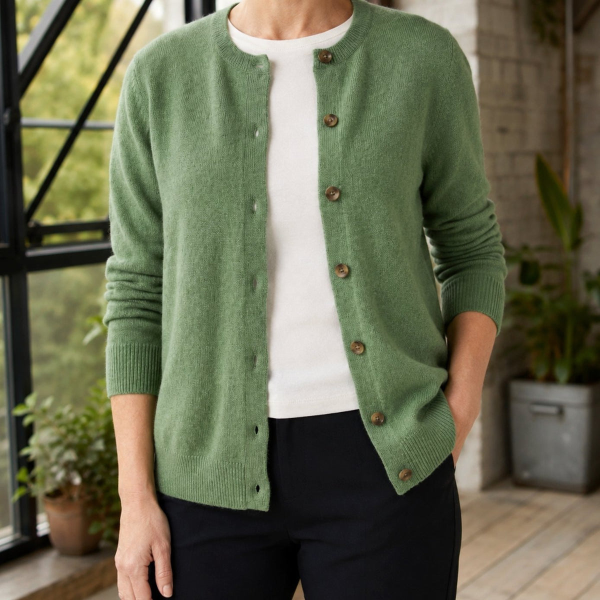 Women's knitted cardigan with a round neck and full button front - green