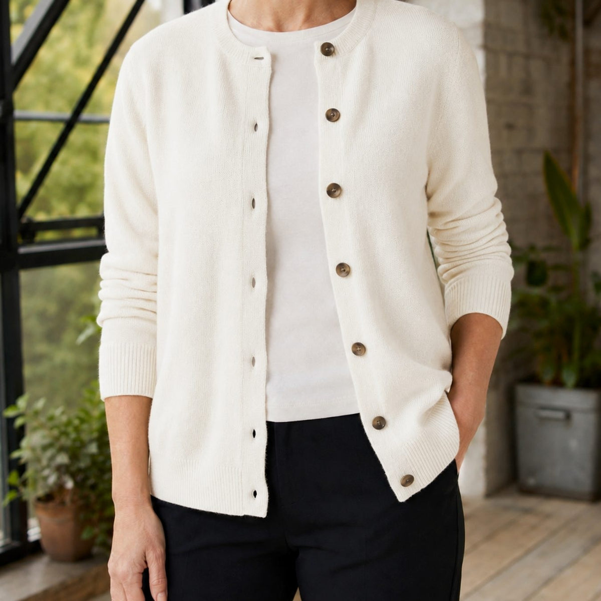 Women's knitted cardigan with a round neck and full button front - off-white