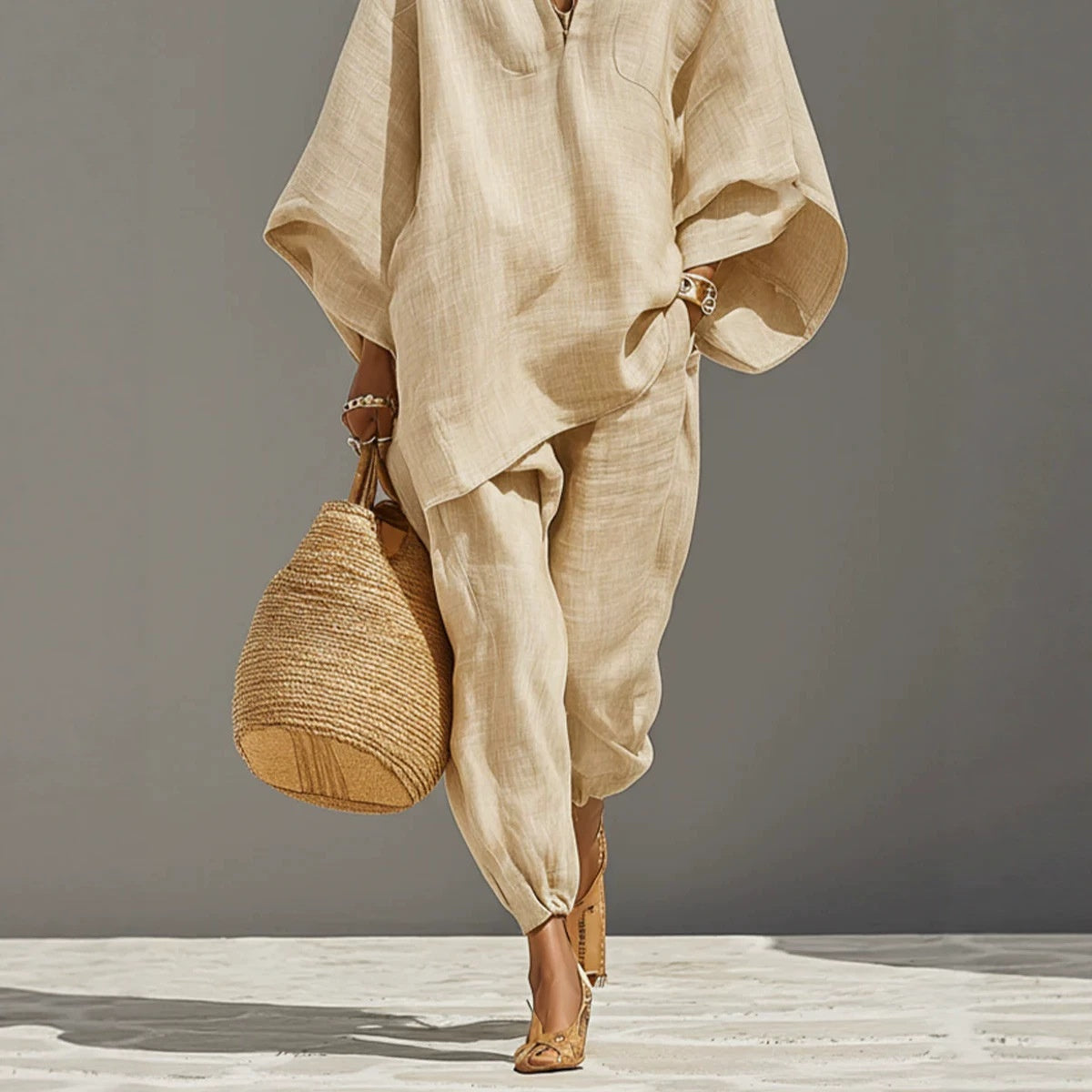 Women's linen look co-ord set with a batwing V-neck top and trousers - cream