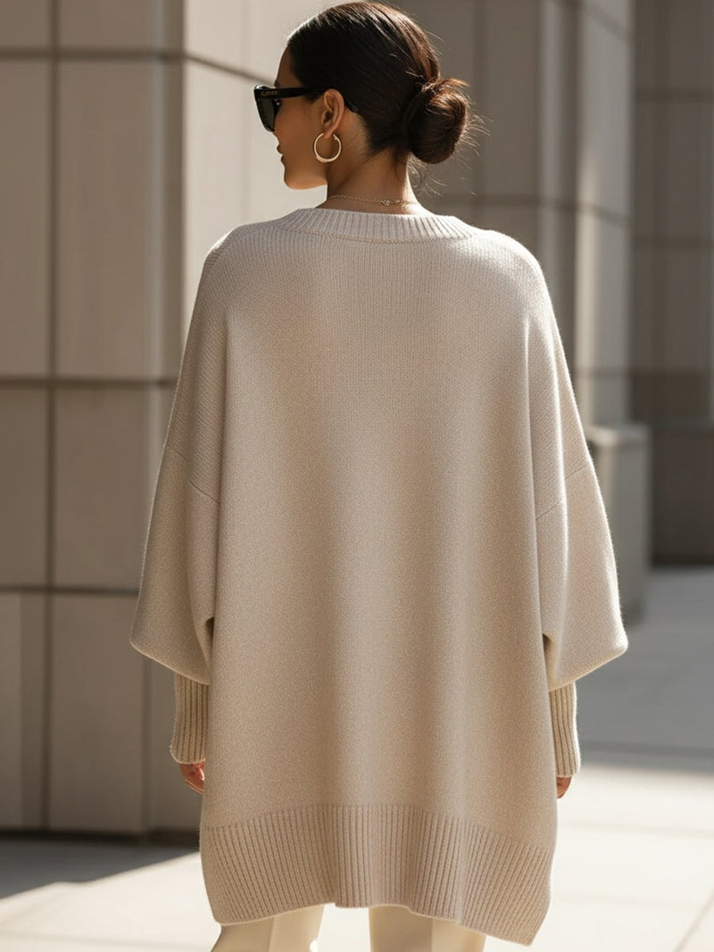 Women's longline oversized jumper with wide sleeves and a ribbed neck, cuffs and hem - beige
