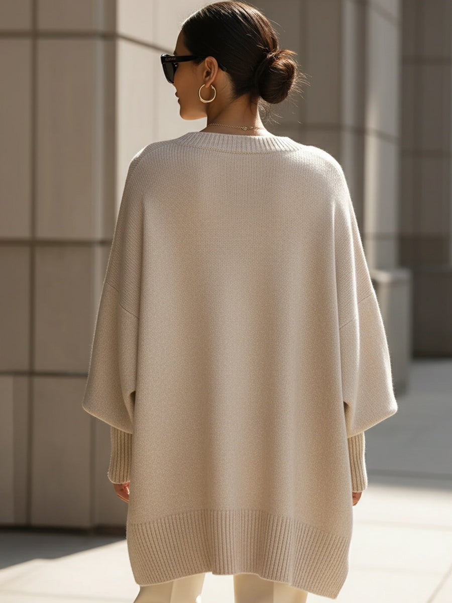 Women's longline oversized jumper with wide sleeves and a ribbed neck, cuffs and hem - beige