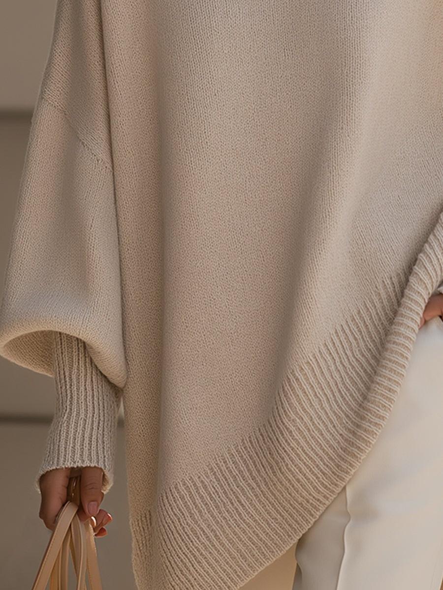 Women's longline oversized jumper with wide sleeves and a ribbed neck, cuffs and hem - beige