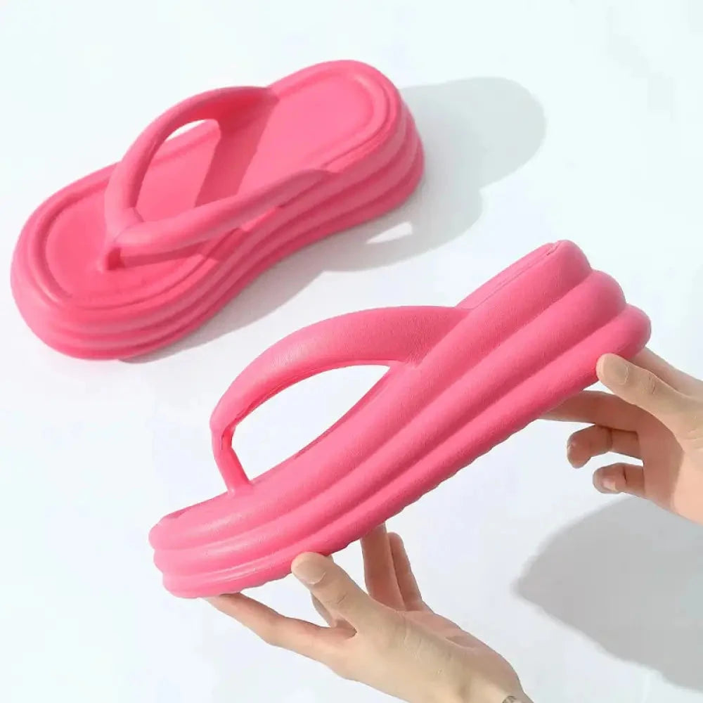 Platform flip flops in EVA with thick sole and wide straps