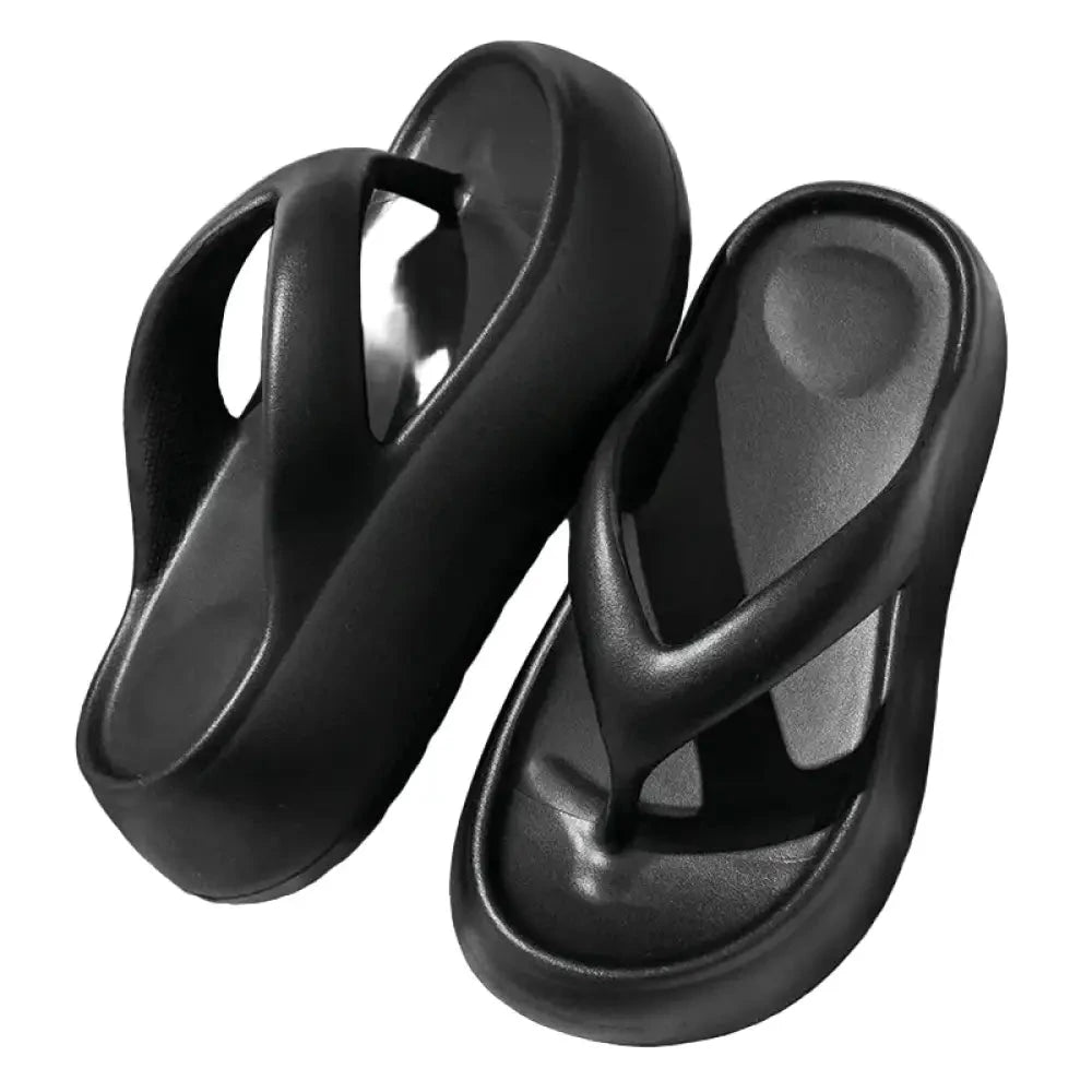 Platform flip flops in EVA with high sole, wide straps and hollowed footbed - black