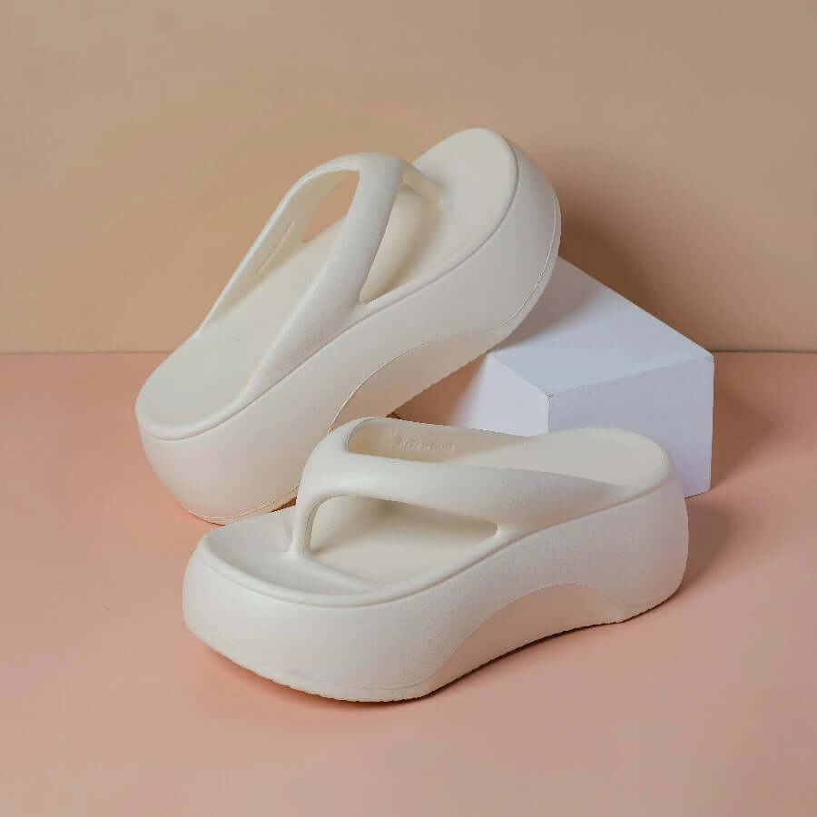 Platform flip flops in EVA with a wide toe-post strap - cream