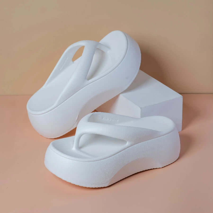Platform flip flops in EVA with a wide toe-post strap - white