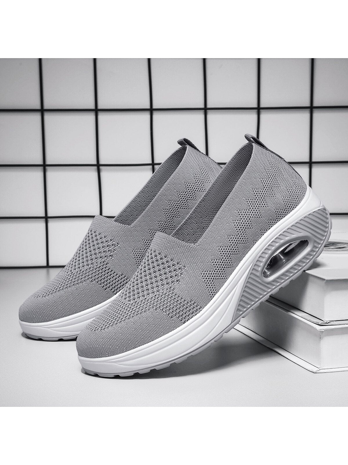 Slip-on shoes for women with knit upper, low rounded opening and thick air cushion sole - grey