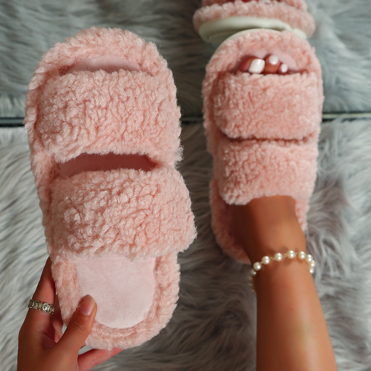 Open-toe slippers with two wide teddy bands, a plush footbed and white sole - pink
