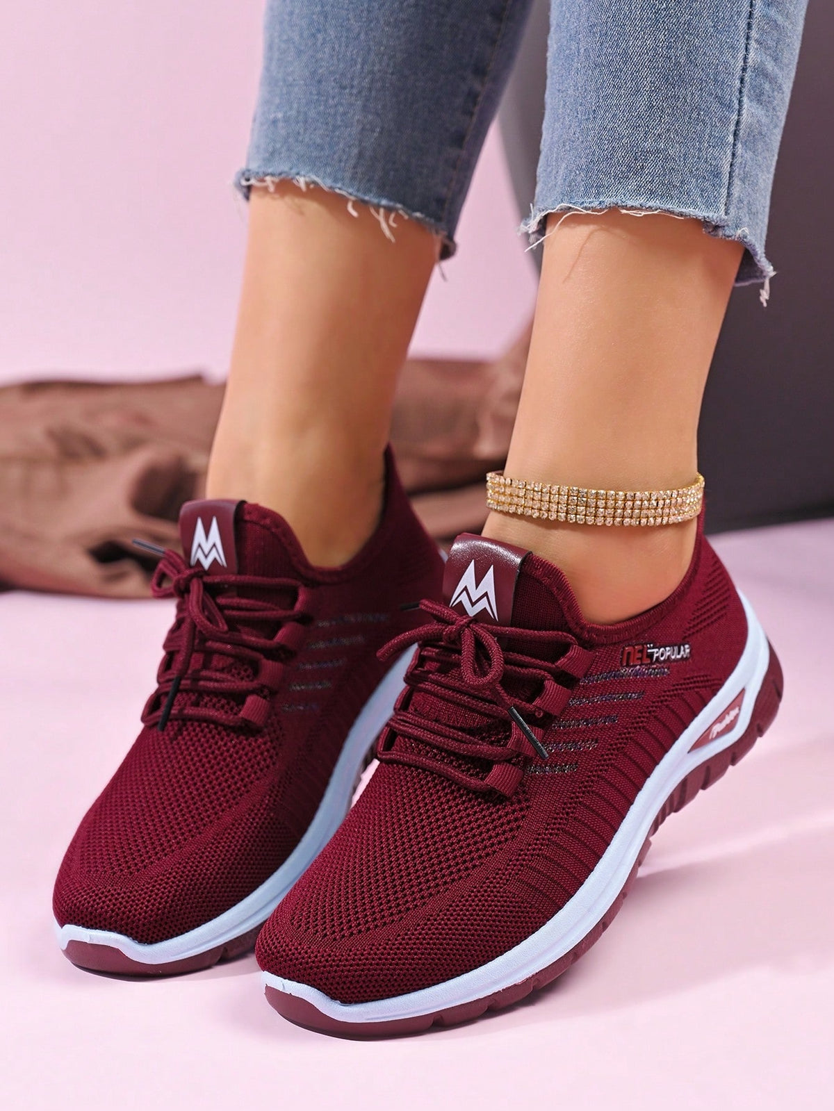 Knit trainers for women with elastic laces, small emblem on the tongue and thick curved sole - view 4