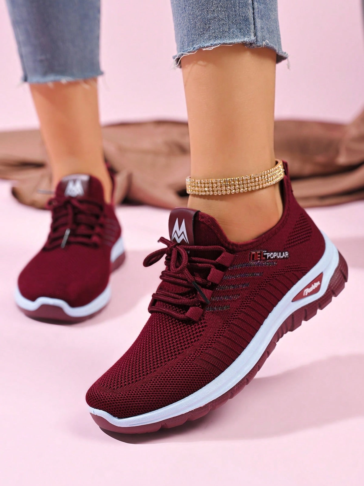 Knit trainers for women with elastic laces, small emblem on the tongue and thick curved sole - view 5