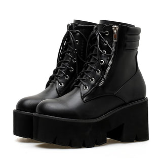 Women's black lace-up platform ankle boots, pair