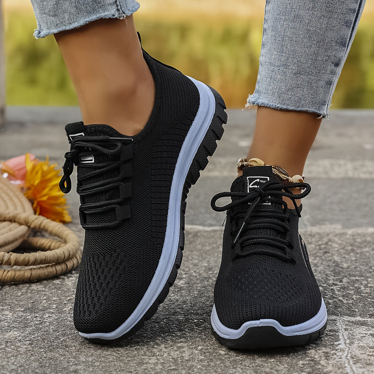 Women's wide fit knit trainers with a thick cushioned sole - black