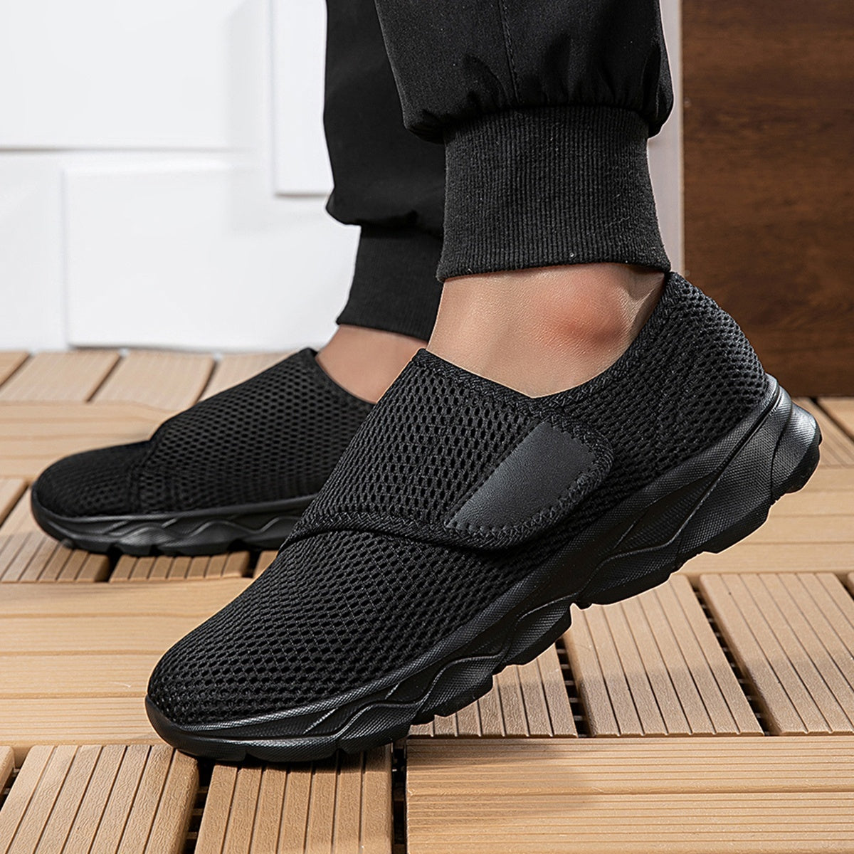 Wide fit mesh shoes for women with broad hook and loop strap over the instep and flat tread sole - view 13