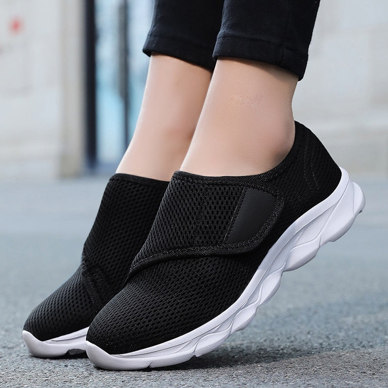 Wide fit mesh shoes for women with broad hook and loop strap over the instep and flat tread sole - view 6