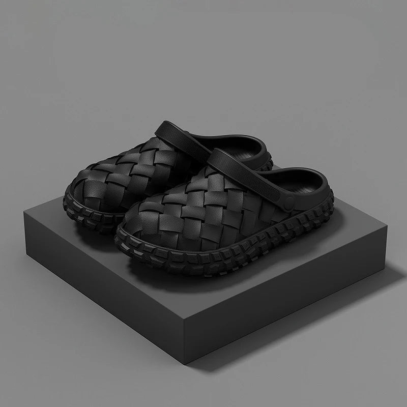 EVA clogs with a woven look, thick sole with chunky tread and swivel heel strap - black
